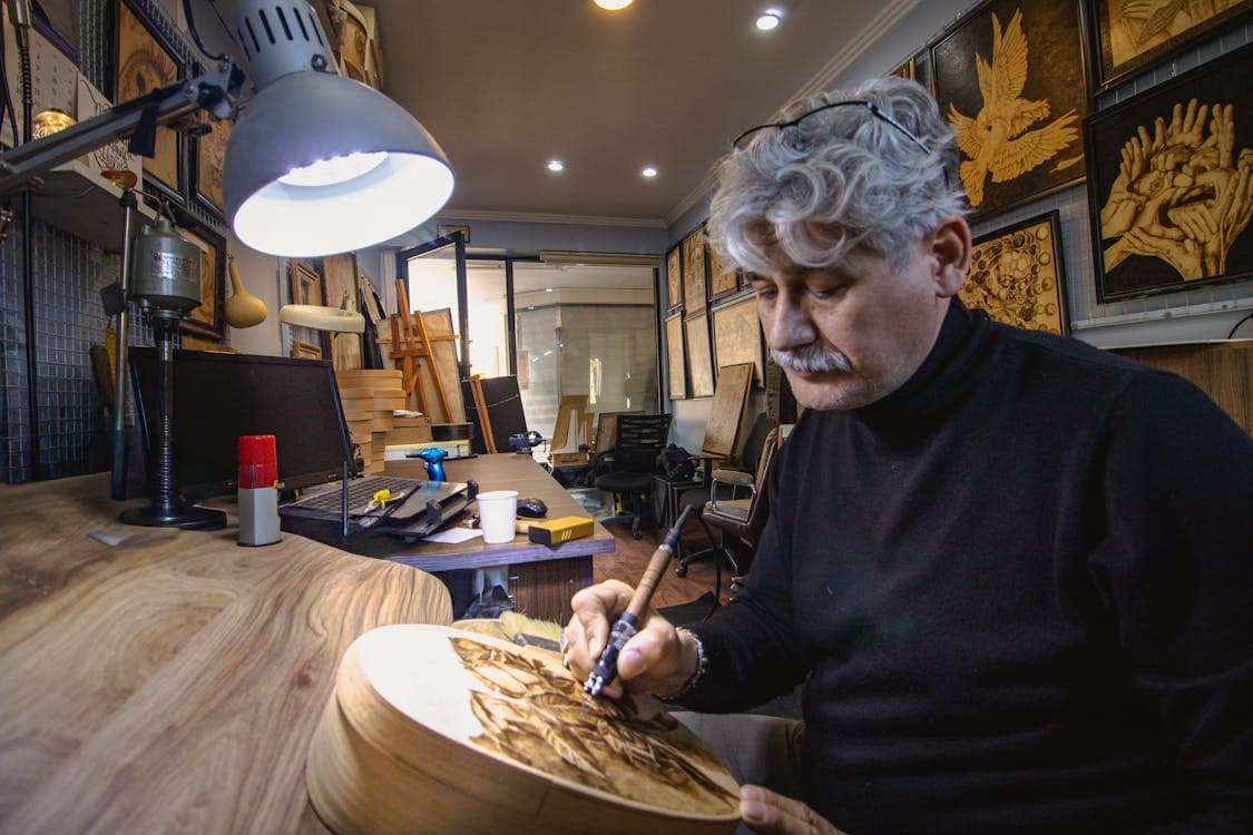 Artisan at work in the Quartzline Engraving workshop